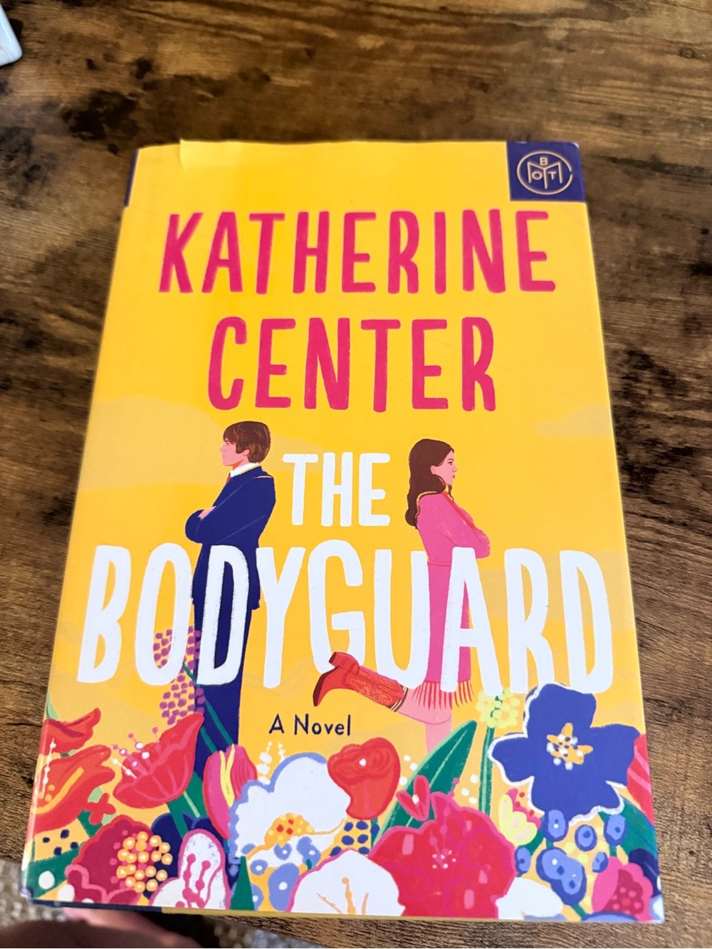 The Bodyguard by Katherine Center — Yellow & Pink Novel Cover